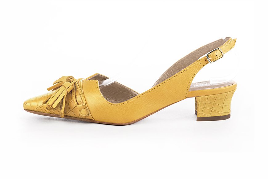 Mustard yellow women's open back shoes, with a knot. Tapered toe. Low kitten heels. Profile view - Florence KOOIJMAN